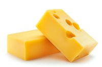 Fresh yellow cheese blocks with holes, one Swiss-style and one solid piece on white background, isolated food photography for dairy product marketing.