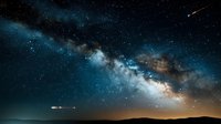 Dramatic night sky with bright Milky Way galaxy stretching across horizon over dark silhouetted landscape, shooting stars streak through starry cosmos.