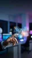 Businessman hand touching digital communication icons in modern office environment with holographic interface technology for customer service solutions.