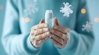 Elderly hands holding vaccine vial with floating virus particles against blurred turquoise background. Medical healthcare concept for vaccination and immunization.