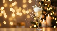Champagne pouring into elegant flute glass with golden bokeh lights background for celebration and festive occasions.