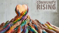 Diverse group of painted hands reaching upward together in unity, symbolizing community support, teamwork, and collective growth for nonprofit campaigns and social causes.