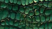 Emerald green crocodile skin texture with dark shadows and glossy surface showing detailed scales pattern and natural leather structure. For luxury design projects.