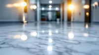 Luxurious marble floor with blurred bokeh lights in modern office hallway interior. Elegant corporate space with reflective surface and warm lighting creates upscale ambiance.