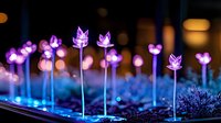 Decorative LED light garden with purple glowing leaf-shaped bulbs creating magical outdoor illumination against blurred city bokeh background at night.