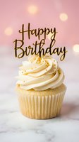 Vanilla cupcake with swirled cream frosting and gold Happy Birthday topper on marble surface with soft pink bokeh background.