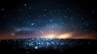 Magical starry night sky with glowing horizon and sparkling bokeh lights creating dreamy atmosphere. Cosmic dark blue background with stars and orange sunset glow.