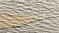 Natural beige rope texture with twisted fibers creating horizontal pattern for nautical maritime crafts backgrounds and rustic design projects.
