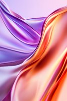 Luxurious flowing silk fabric in purple and orange creates elegant waves and folds with smooth gradient transitions, suitable for luxury brand marketing and fashion designs.