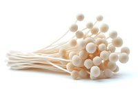 Fresh white enoki mushrooms bunch on white background, raw organic Japanese fungi with long thin stems and small round caps, isolated food ingredient.