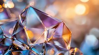Crystal prism with rainbow light refraction creating colorful geometric patterns and bokeh background for luxury jewelry and optical science concepts.