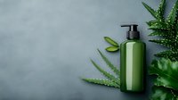 Green cosmetic bottle with pump dispenser surrounded by fresh aloe vera leaves on textured surface for natural skincare and beauty product branding.