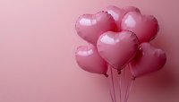 Pink heart-shaped balloons bunch on pastel background for Valentine's Day celebration, romantic events, love concept, wedding decoration, anniversary party.