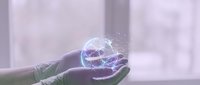 Hands holding glowing digital sphere with network connections and light particles, representing technology, innovation, data transfer, and global communication concepts for business and digital solutions.