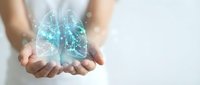Digital brain hologram floating above cupped hands with glowing neural networks and light particles for AI technology and innovation concepts.