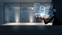 Businessman hand holding futuristic holographic interface with digital data visualization in modern office environment for technology presentations.