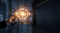 Businessman hand holding glowing light bulb with gear symbol, representing innovation, technology, and creative business solutions in corporate environment.