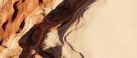 Abstract flowing wood grain texture with warm brown and cream tones creating organic waves and natural patterns for modern interior design projects.