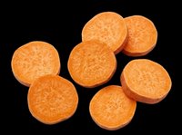 Sliced carrot rounds isolated on transparent background, ready for culinary design, recipe graphics, food packaging, print-on-demand products, and digital cooking illustrations.