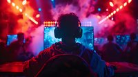 Silhouette of gamer wearing headphones at esports tournament with dramatic red and purple lighting, monitors and crowd in background. Competitive gaming atmosphere.