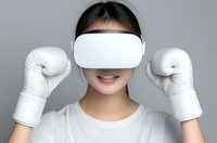 Young Asian woman wearing white VR headset and boxing gloves in fighting pose against gray background for virtual reality gaming and fitness concepts.