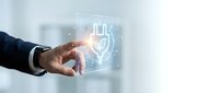 Businessman hand touching digital holographic shield icon with security lock symbol on futuristic interface for cybersecurity and data protection concepts.
