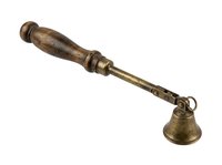 Antique brass candle snuffer with wooden handle, isolated on white background, ready for design use on merchandise, home decor projects, and vintage-themed applications.