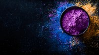 Vibrant cosmetic pigment powders scattered on dark background with purple powder in round container, creating artistic makeup composition for beauty industry.