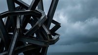 Tangled black metal beams and structural framework against a dramatic stormy sky with dark clouds, suitable for industrial, architectural, and abstract design projects.