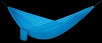 Bright blue nylon hammock isolated on transparent background, ready for outdoor gear catalogs, camping clipart, stickers, t-shirt design, and print on demand projects.