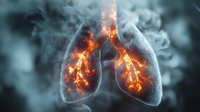 Anatomical visualization of burning human lungs with glowing embers and smoke effects, depicting respiratory system damage and inflammation in dramatic lighting.