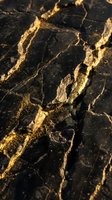 Black marble surface with gold veining pattern, ideal for luxury interior design, flooring, countertops, and high-end product backgrounds.