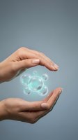 Two hands with light skin tone cradling glowing transparent spheres against neutral background. Concept for skincare, cosmetics, wellness, and beauty product promotion.