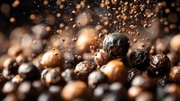 Aromatic black and white peppercorns in macro shot with water drops and spice particles floating in dark moody atmosphere, culinary background for food design.