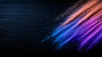 Vibrant diagonal streaks of blue, purple, and coral powder explosion against dark background, creating dynamic motion effect with scattered particles.