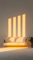 Modern white sofa with warm sunlight casting geometric shadows through window on minimalist gray wall, potted plant adds natural accent.