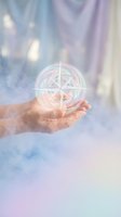 Hand holding glowing compass symbol with ethereal light rays and soft pastel colors for spiritual guidance and direction concepts.