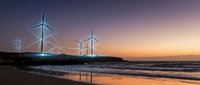 Offshore wind turbines illuminated at dusk along a sandy beach with golden sunset sky and calm ocean waters, representing renewable energy and sustainable power generation.