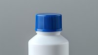 White plastic medical bottle with blue ribbed cap on gray background, pharmaceutical container for liquid medicine, pills or supplements. Clean minimal studio shot.