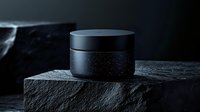 Black luxury cosmetic cream jar on dark stone platform with dramatic lighting and smoke effects, showcasing premium skincare product packaging for beauty industry.