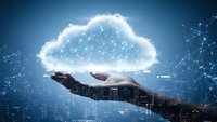 Cloud computing technology concept with glowing digital cloud floating above open palm against futuristic network background for business solutions.
