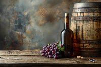 Red wine bottle with fresh grape cluster and rustic wooden barrel on weathered table against moody dark background, dramatic lighting for wine industry.