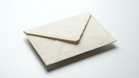 Handmade recycled paper envelope with rough textured edges on white background, isolated for stationery, wedding, and eco-friendly design projects.
