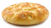 Freshly baked round artisan bread loaf with golden brown crust and soft texture, isolated on white background for food photography and menu design.