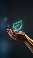 Hands holding glowing green leaf hologram symbolizing environmental protection, sustainability and eco-friendly technology innovation.