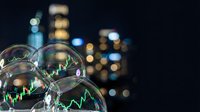 Financial market bubbles floating against blurred city skyline at night with green trading charts reflecting economic speculation and investment risks.