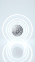 Silver bitcoin coin with glowing white circular ripples on reflective surface representing cryptocurrency technology and digital finance innovation.