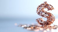 Dollar sign made of scattered rose gold glitter and sparkles on light background with selective focus and bokeh effect, financial concept.