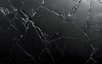 Dark marble texture with natural white veining pattern creates dramatic contrast on polished stone surface, suitable for luxury interior design backgrounds.