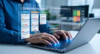 Professional businessman using laptop with holographic project management dashboard displaying task scheduling and data analytics interface.